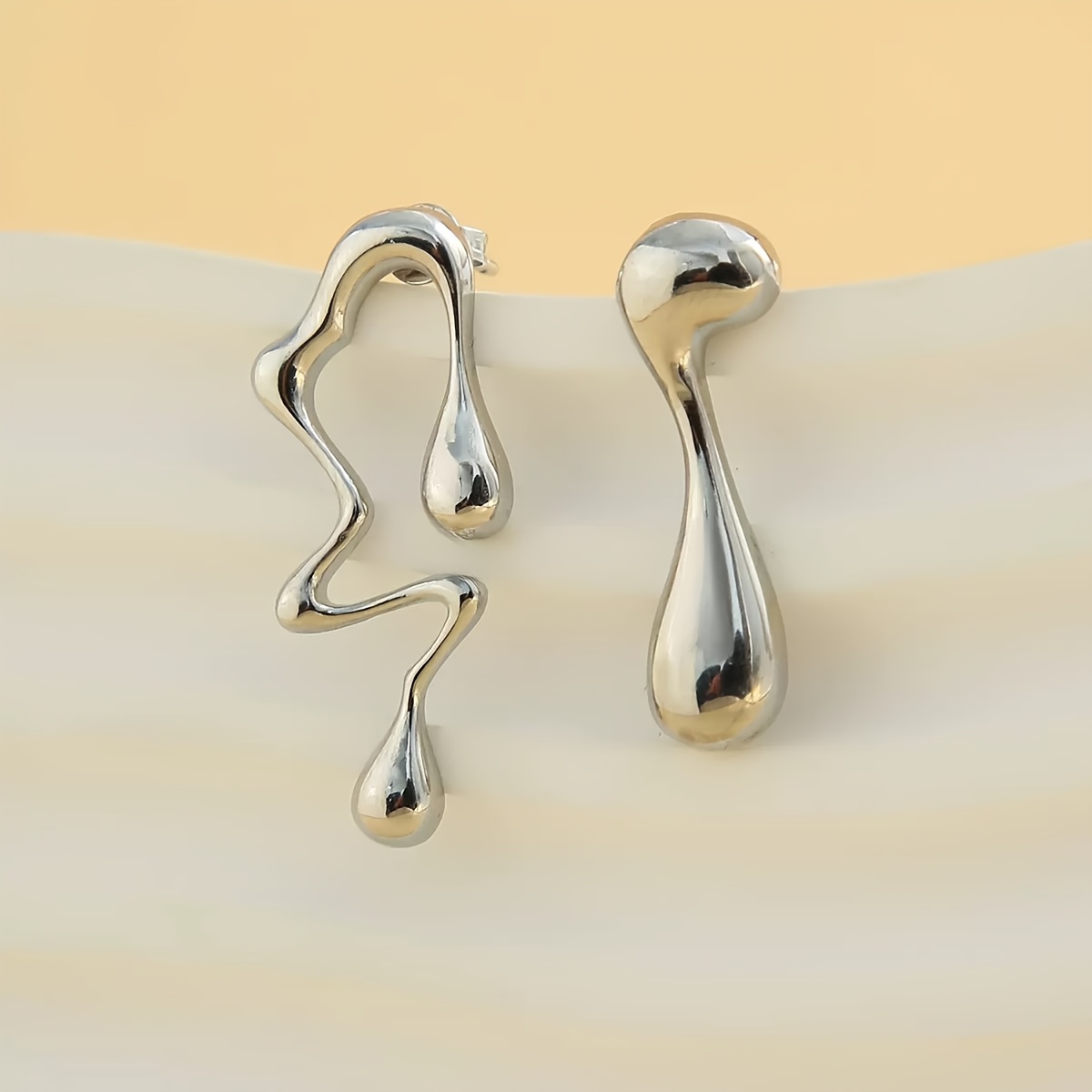pair of hypoallergenic   steel earrings for women minimalist curved teardrop designs comfortable lightweight jewelry for daily wear parties summer mother s day gift versatile elegant accessories Product details 5