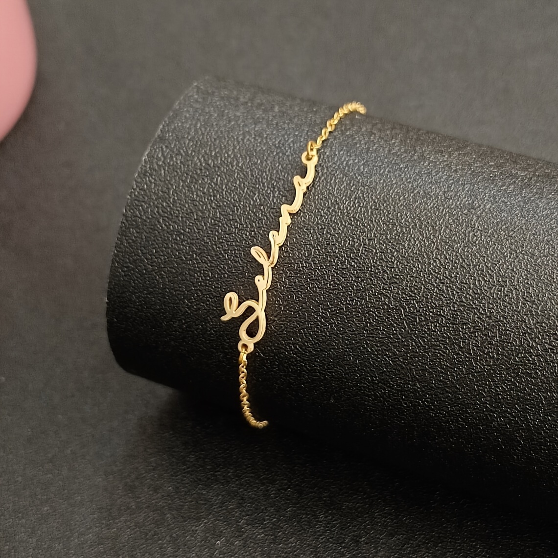 elegant custom golden stainless steel name bracelet for women -   in cursive script, ideal for casual attire &   like birthdays, holidays, weddings & graduations details 1