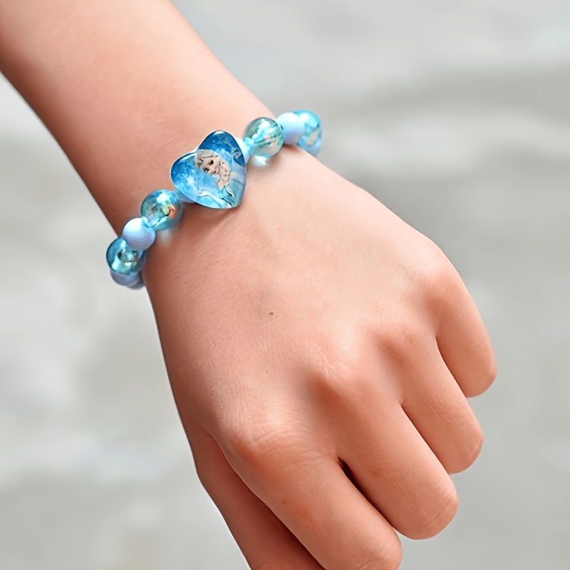 E-shop Schlüsselanhänger für Damen – ./4 Stk. Die Eiskönigin Prinzessin Elsa in Blau, Pink, Lila Design, mehrfarbiges