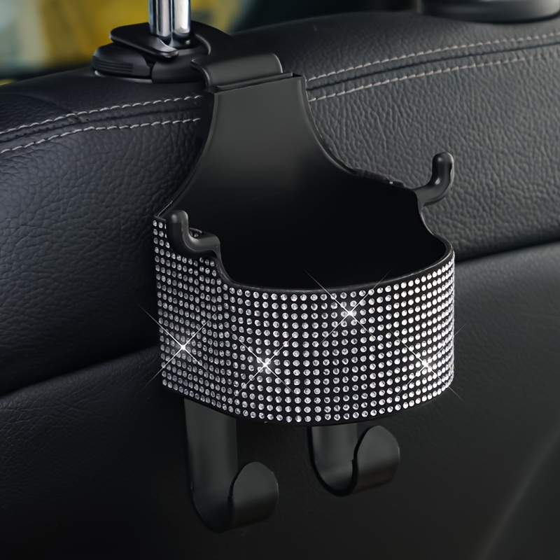 The Water Drill Water Cup Holder Hook Is Hung On The Back Seat Of The Car, And Storage Box Trash On The Back Of The Seat.