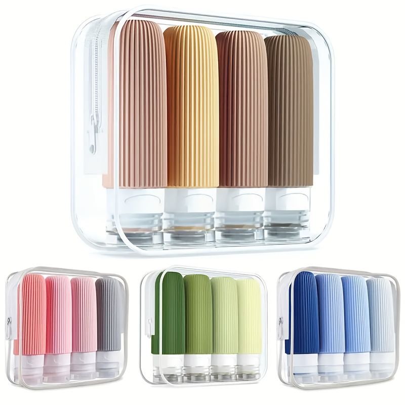 

4 Reusable Silicone Travel Bottles, Shampoo, Conditioner, Lotion And Shower Gel Containers. The Is Very Suitable For Travel, Hiking, Gym And Camping