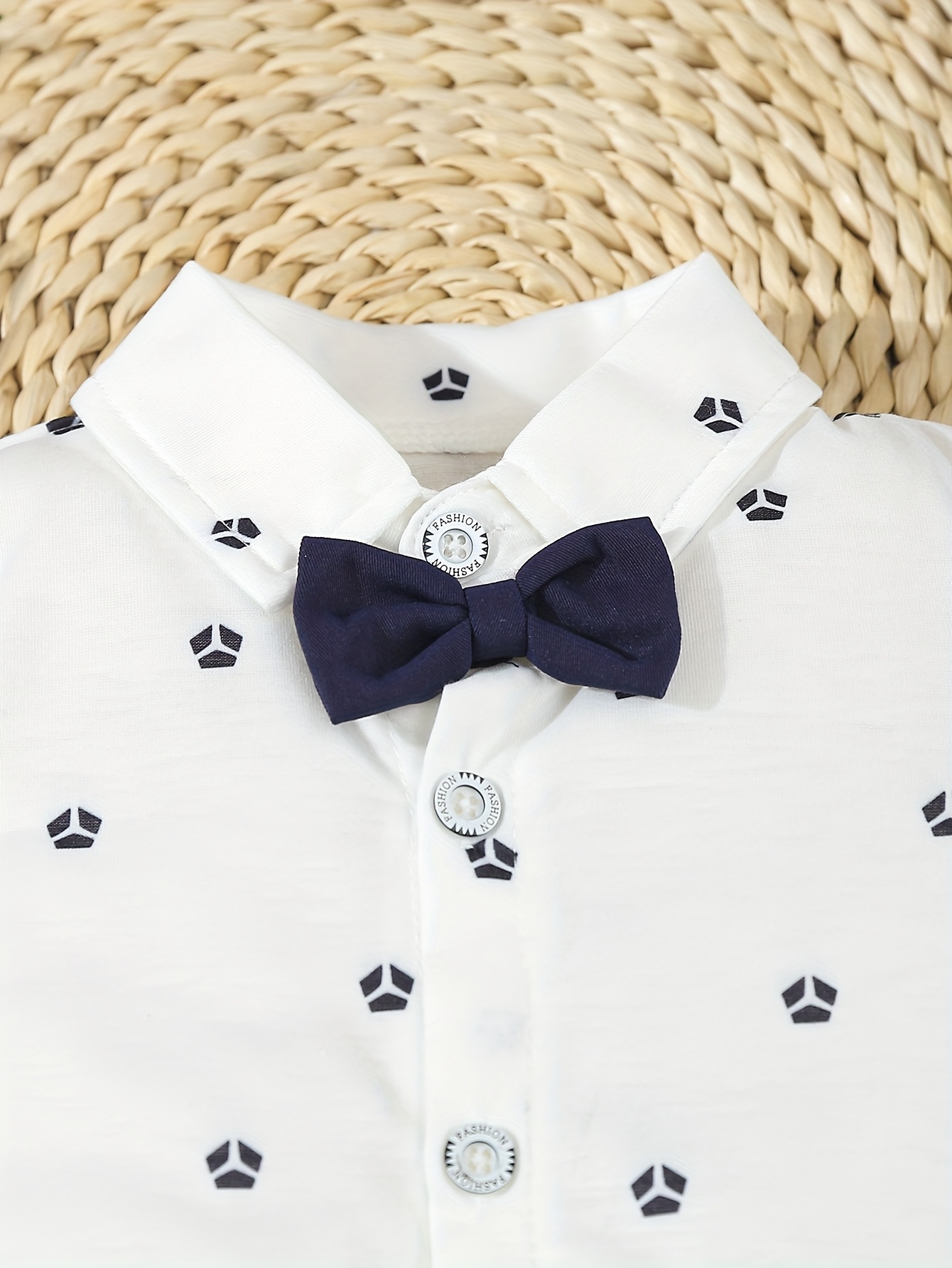 a formal three piece gentleman outfit for baby boys featuring a short sleeve shirt with geometric patterns and a bow tie shorts with suspenders and a   hat stylish and   its a   for summer birthday parties Product details 2
