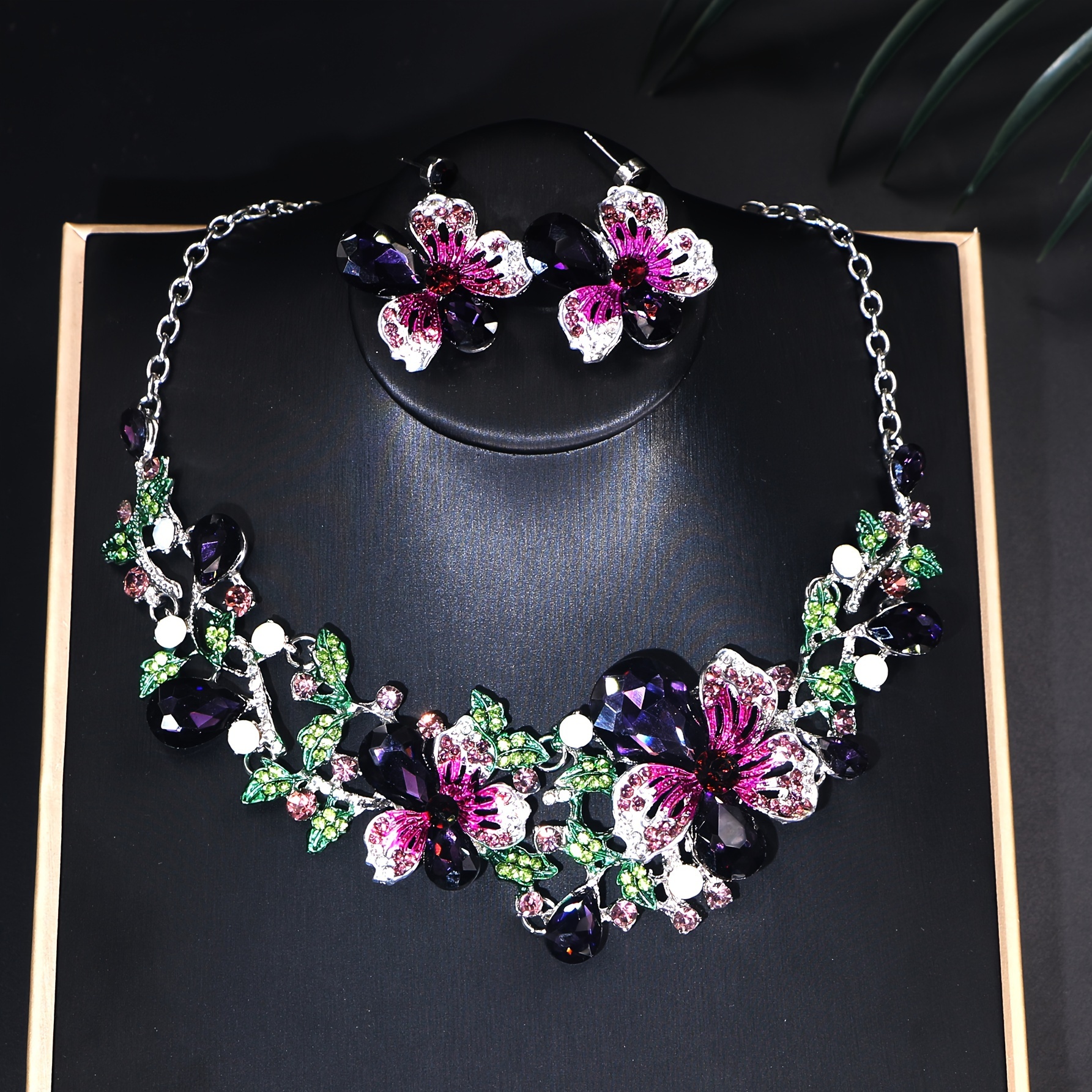A Luxurious And Sparkling Floral Colored Necklace And Earring Set, Perfect for Brides, Wedding Jewelry, And Party Accessories with a Bling Effect.