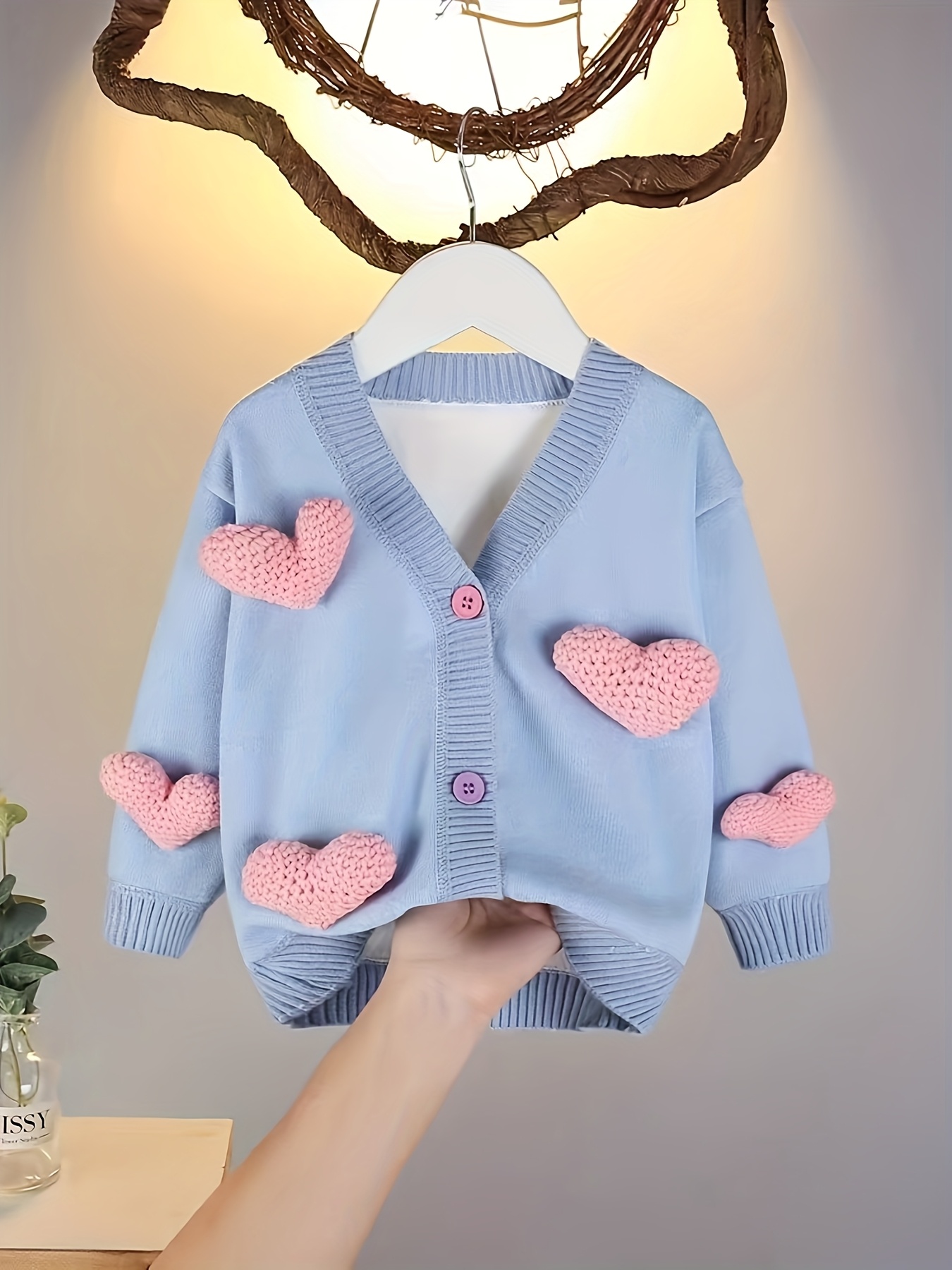 Cardigan corazones expuestos