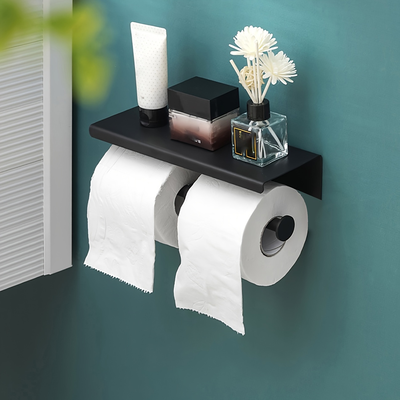 Black toilet paper holder with reserve
