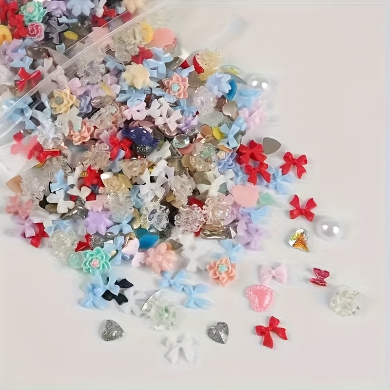 TEMU A Set Of 300 Assorted Nail Decorations In Different Colors And Shapes, Including Hearts And Bows, Made From Resin. Flat-bottomed Rhinestones Are