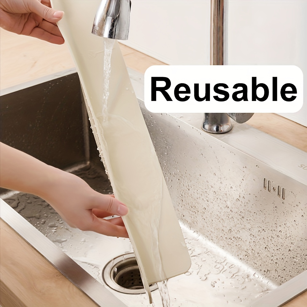 heavy-duty silicone sink splash guard - non-slip, easy-  barrier for kitchen, bathroom, dishwashing - fits standard sink  , prevents splash & mess, modern  , kitchen sink accessory, mess prevention, sleek kitchen accessory, spacesaving solution, nonslip grip, high quality material, basin protector, cleaning enthusiasts, busy households Product details 3