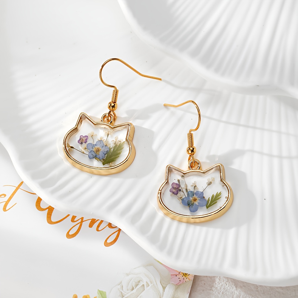 Image of Bohemian Cute Cat Shaped Transparent Dried Flower Earrings Stainless Steel Ear Hook Cartoon Animal Daisy Flower Drop Earrings Women's Jewelry Gift