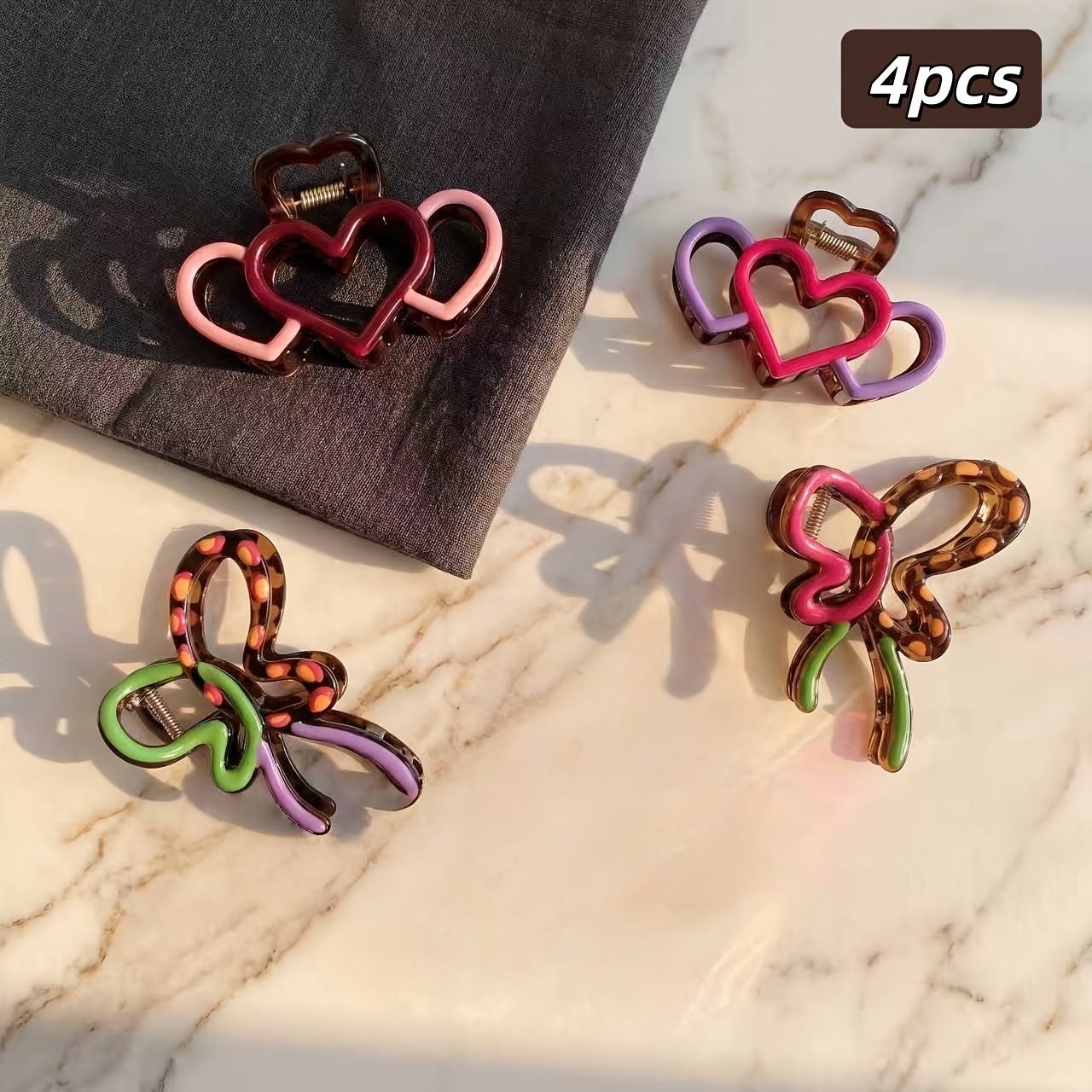 TEMU Lot de 4 pinces à cheveux griffes style doux et cool avec découpes de cœur et de papillon, pinces à cheveux vintage à blocs de couleur pour
