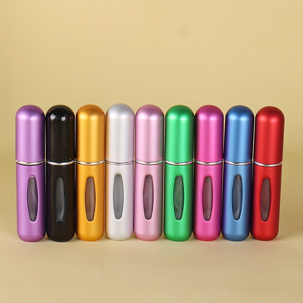 

A Set Of 9 Mini Perfume Sample Bottles, Holding 5ml, In A , With Refillable Bottoms For Repeated Use, Travel.