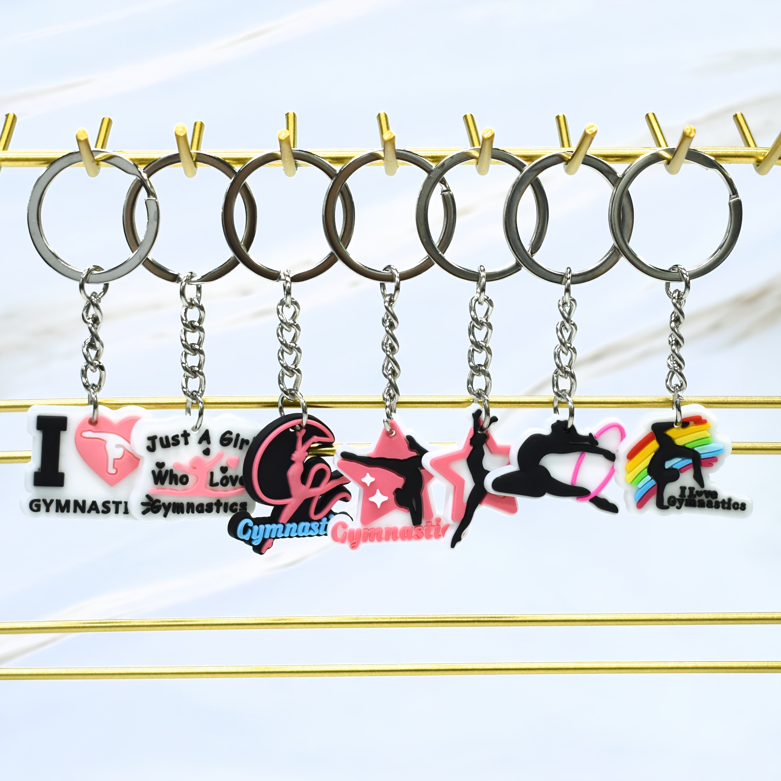 

Set Of 7 Plastic Keychains Featuring A Love For Gymnastics, Training, Women's Gymnastics, And As Accessories For Purses, Backpacks, Or Luggage. Ideal For Birthday Party Gifts.