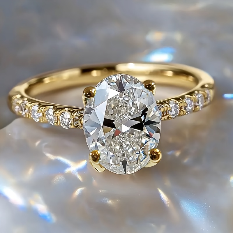E-shop Dieser elegante Verlobungsring aus synthetischem Cubic Zirkonia Kupfer, oval geschnitten, Zinkenfassung, luxuriöser Hochzeitsstil,