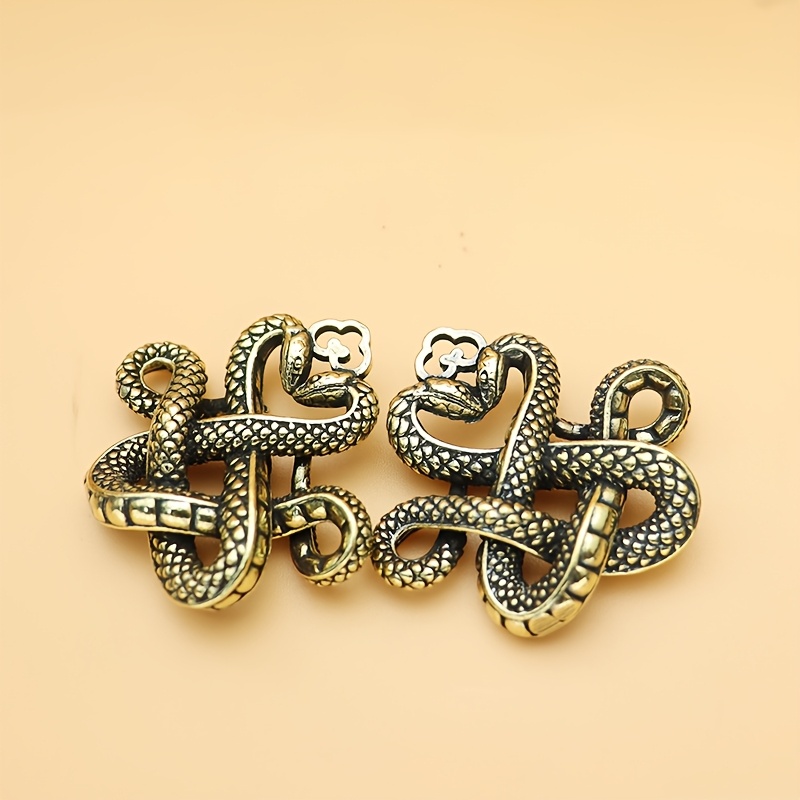 

1pc Vintage Brass Double Snake Knot Keychain, Zodiac Snake Year 2025 Feng Shui Wealth Attracting Charm, Animal Theme Portable Pendant - No Feathers, Electricity-free