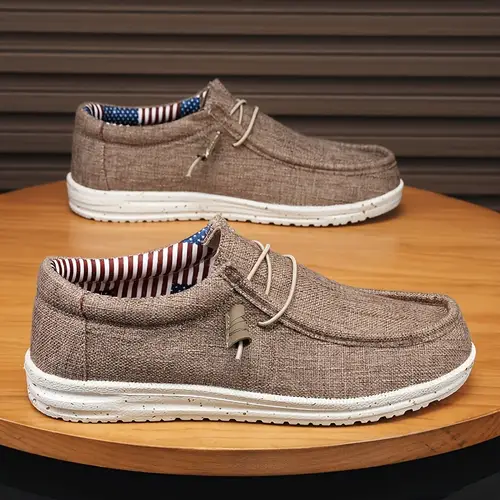 1 pair mens casual slip on loafers solid color cloth upper with md sole and eva insole round toe shoes for vacation and everyday wear