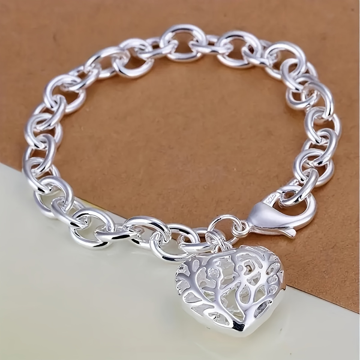 

Light Luxury Elegant And Fashionable Silvery Heart-shaped Hollow Pendant Women' Bracelet