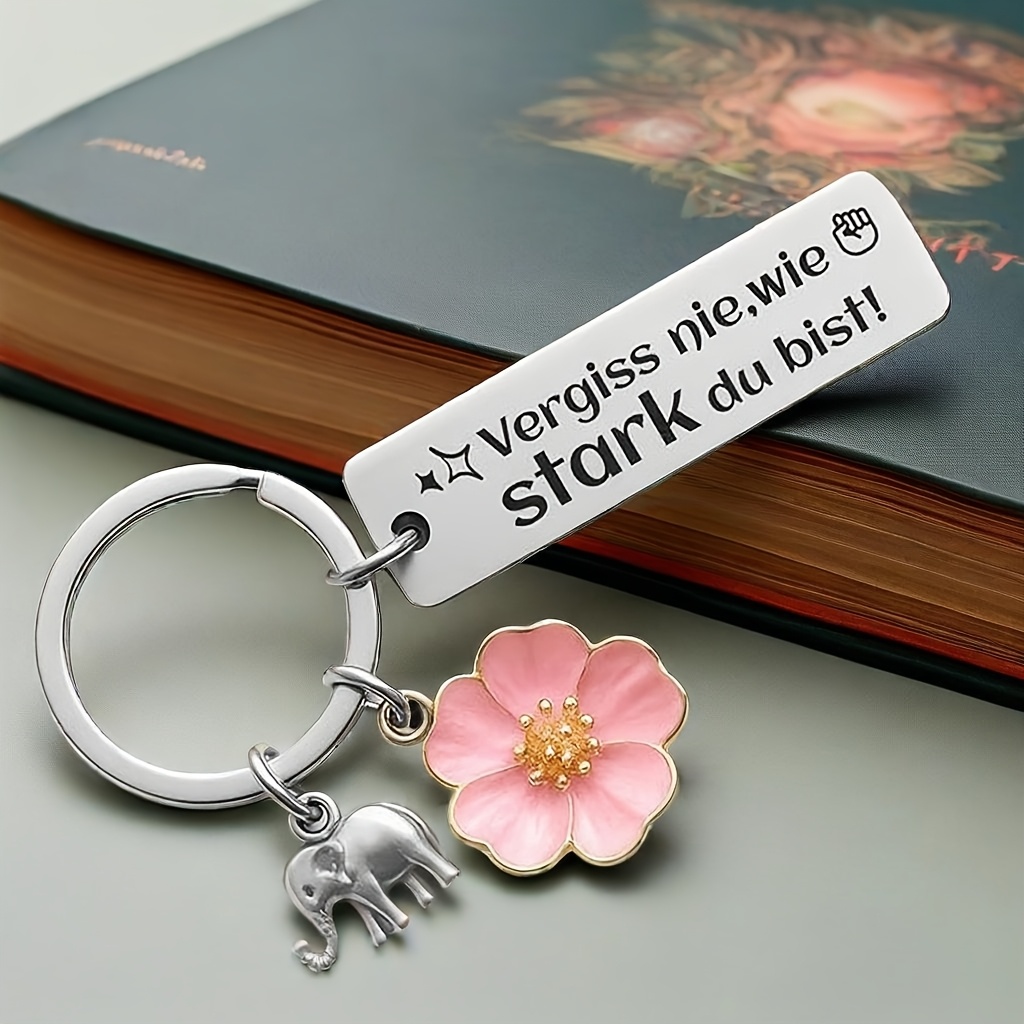 E-shop Inspirierender Schlüsselanhänger mit deutscher "Vergiss Nie Wie Stark Du Bist" Inschrift, Geburtstagsgeschenk für Freundinnen, Rosa Blumen,