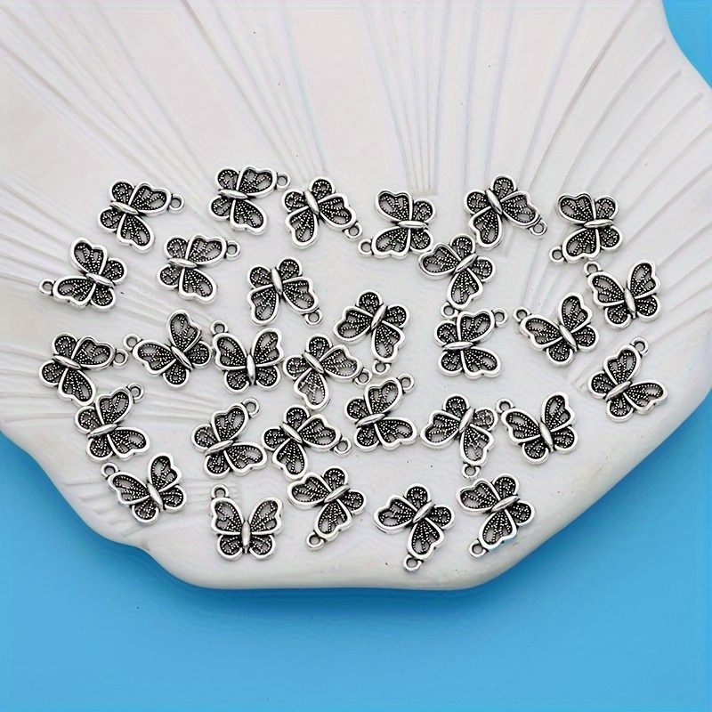Image of 30pcs Of Hollow Charm Pendants, Antique Silvery-plated, Suitable For Small Business Supplies. Made Of Alloy, Pendants Are Perfect For Necklaces And Earrings For Jewelry