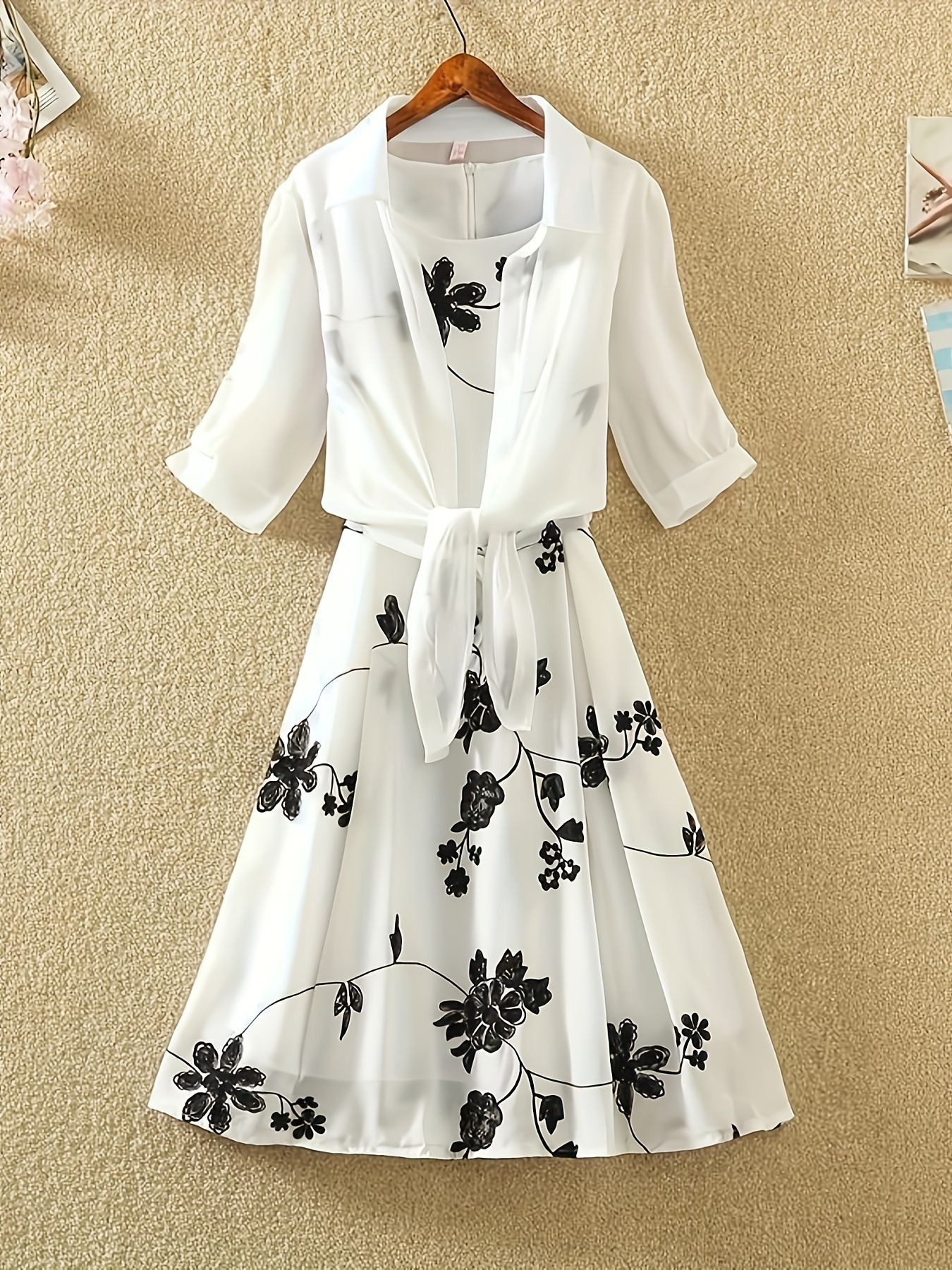 Newness Capri Floral Print Dress A chic floral print midi dress perfect for spring and summer