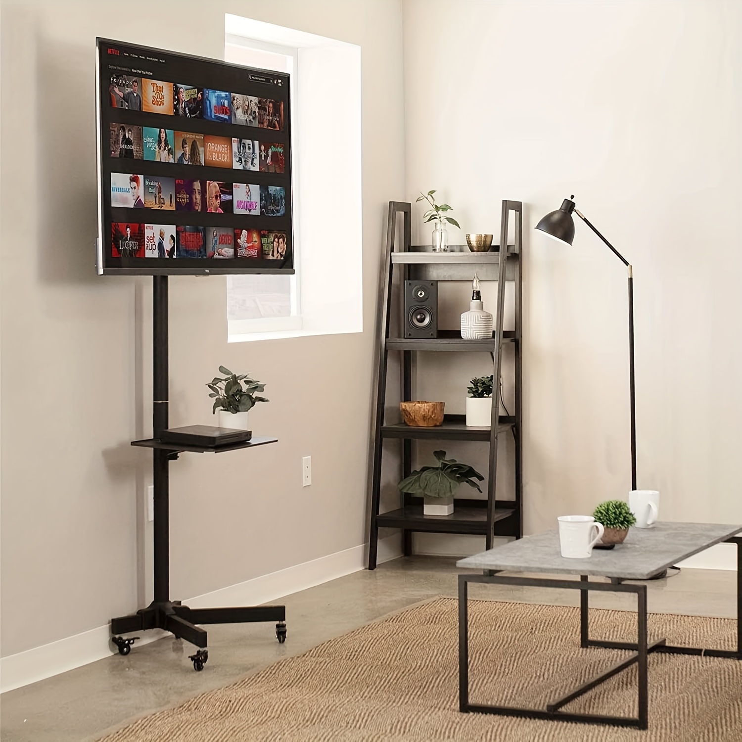 adjustable height mobile tv stand with lockable wheels 360 rotating floor cart for 32 65 inch flat curved tvs 110 lbs capacity black easy assembly removable shelf for laptop or dvd player