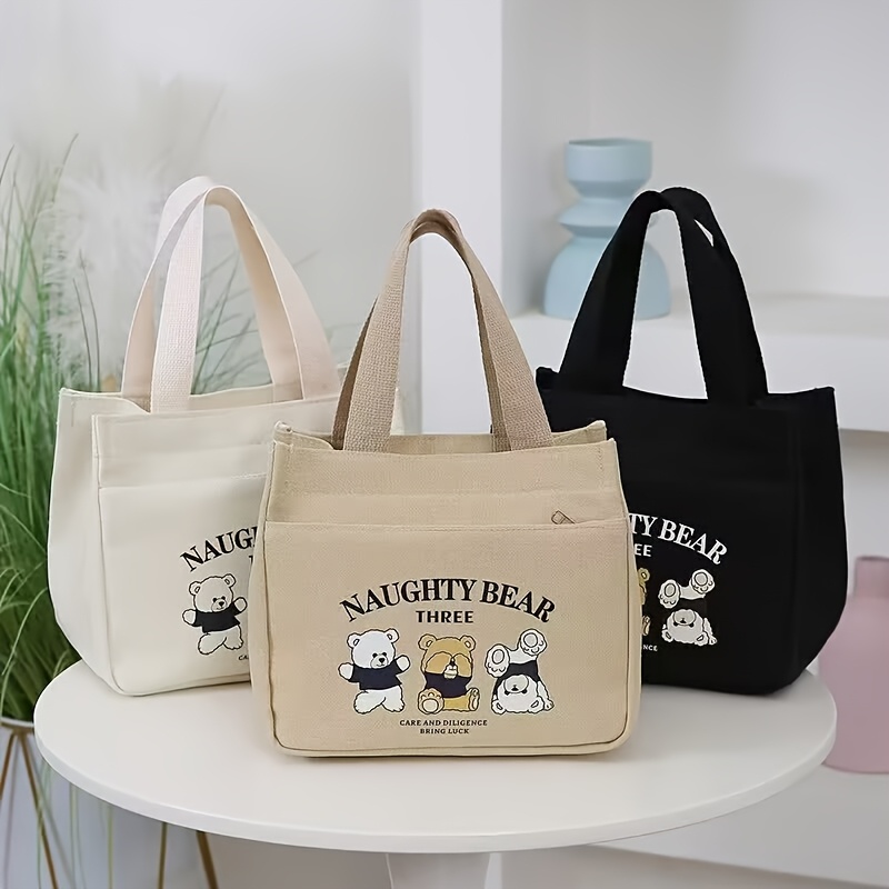 stylish minimalist tote bag with   print lightweight zippered closure fixed shoulder straps cream white khaki black     and casual   casual tote bag   material details 0