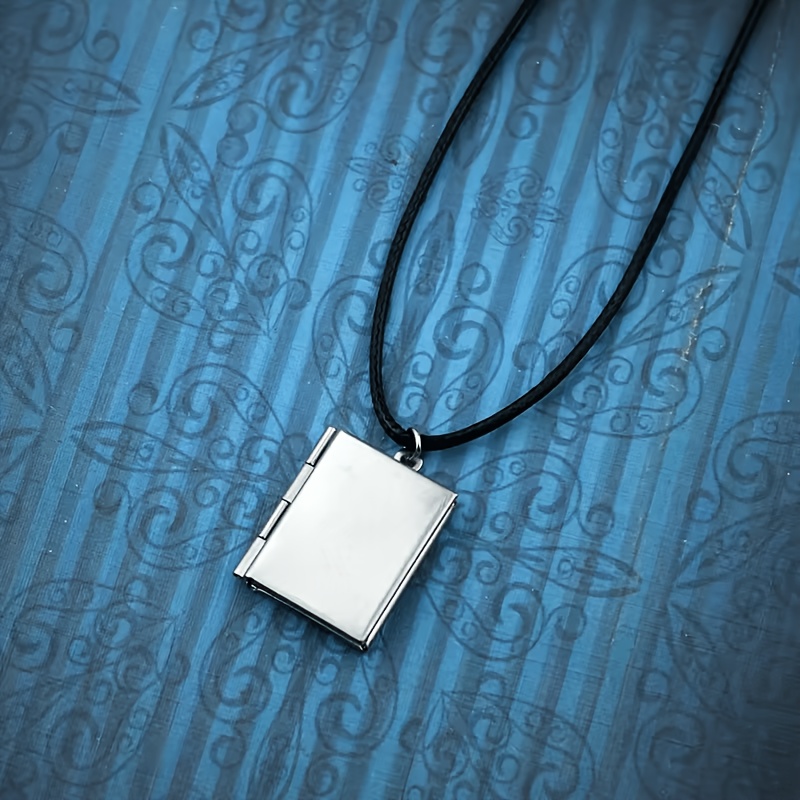 TEMU 1pc Mini Book-shaped Openable Photo Box Pendant Necklace, With Leather Cord, Metallic Glossy Texture, Can Store Small Photos. Literary Retro