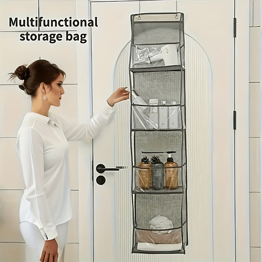 a door mounted organizer with 4 pockets fabric wall mounted storage rack suitable for wardrobe bathroom bedroom   transparent window and reinforced rack including 2 metal hooks used to organize cosmetics toys and miscellaneous items halloween and christmas gifts details 1