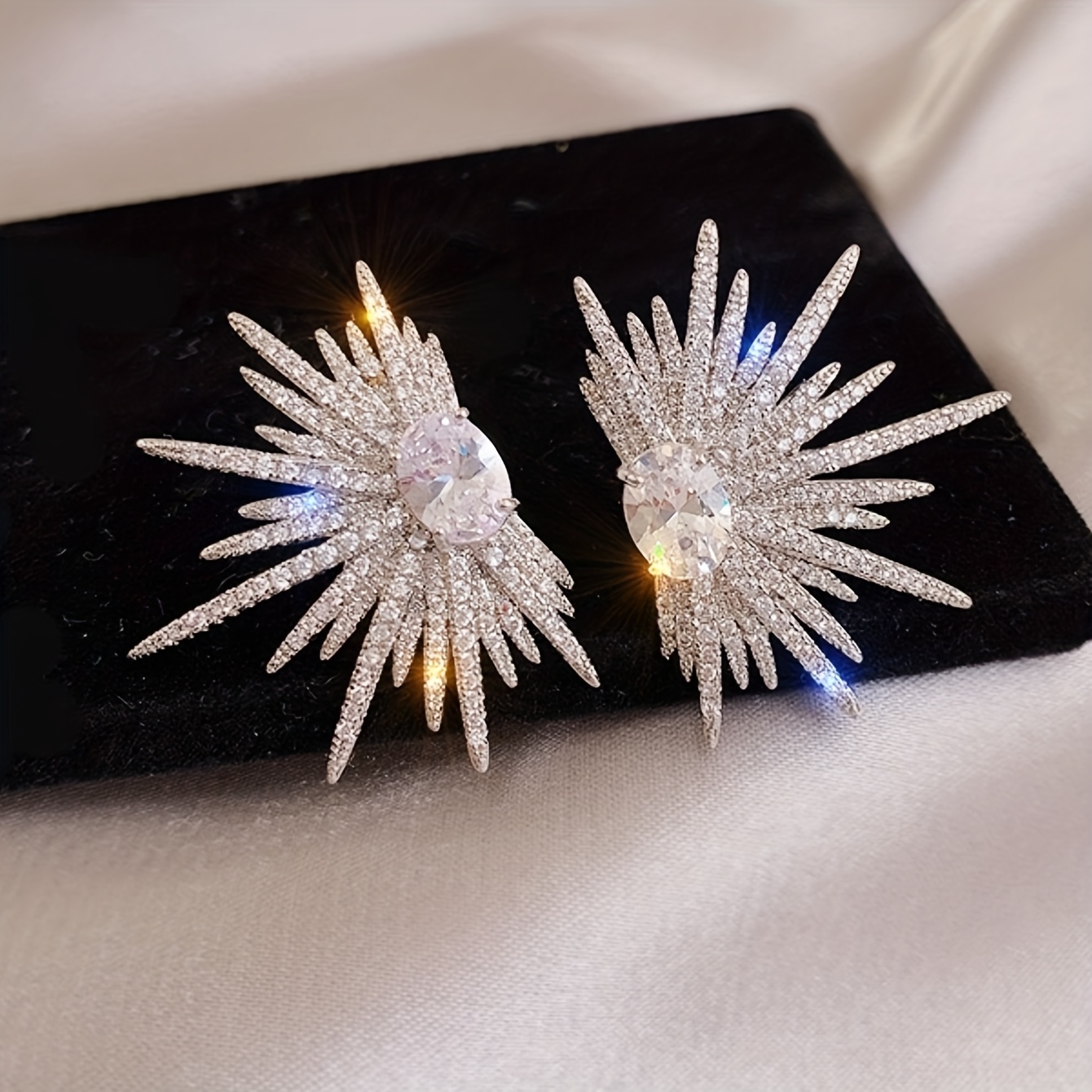 A Pair of Dazzling Wing-Shaped Earrings Adorned with Rhinestones, Perfect for Women. These Elegant And Distinctive Bridal Earrings Are Trendy, Lightweight Statement Pieces Ideal for Proms And Parties