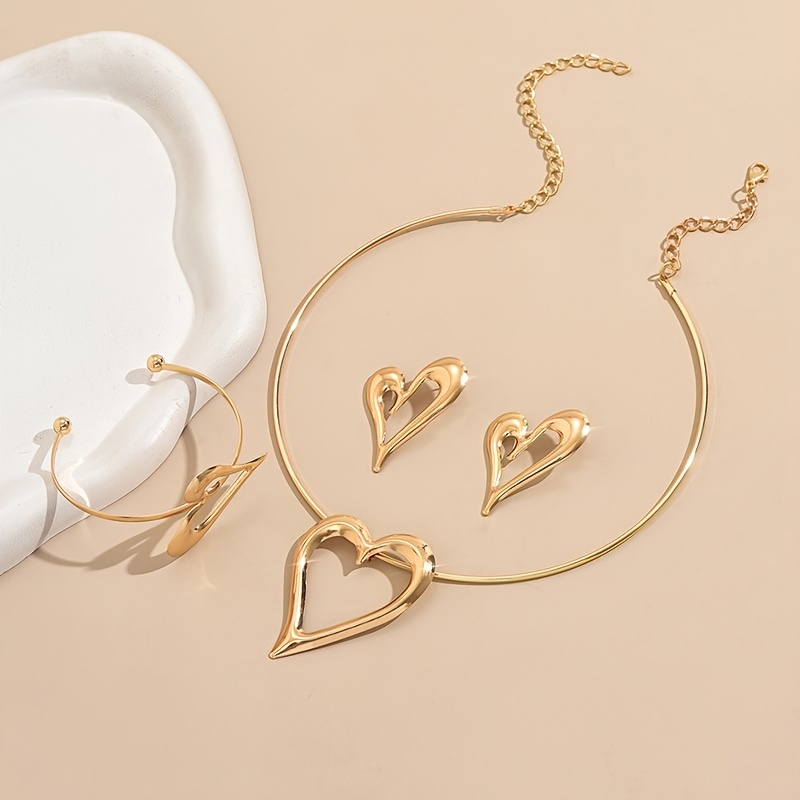 E-shop 4-teiliges Set elegante geometrische Hohlherz-Ohrringe und Armband-Halskette für Damen