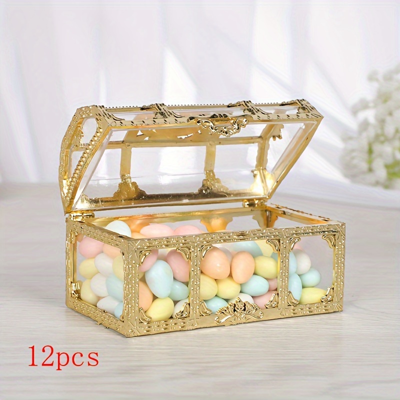 

A Set Of 12 Wedding Favor Candy Boxes, Electroplated In Golden Plastic With Hollowed-out Design.