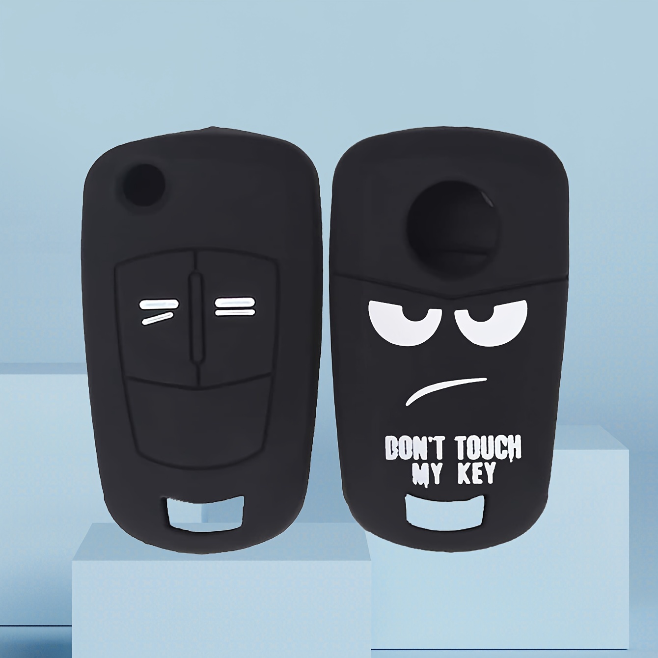 A Single Black Silicone Protective Case For Car Keys, Suitable For Models , , Vectra, And , Designed To Prevent Drops And Fits 2 Buttons