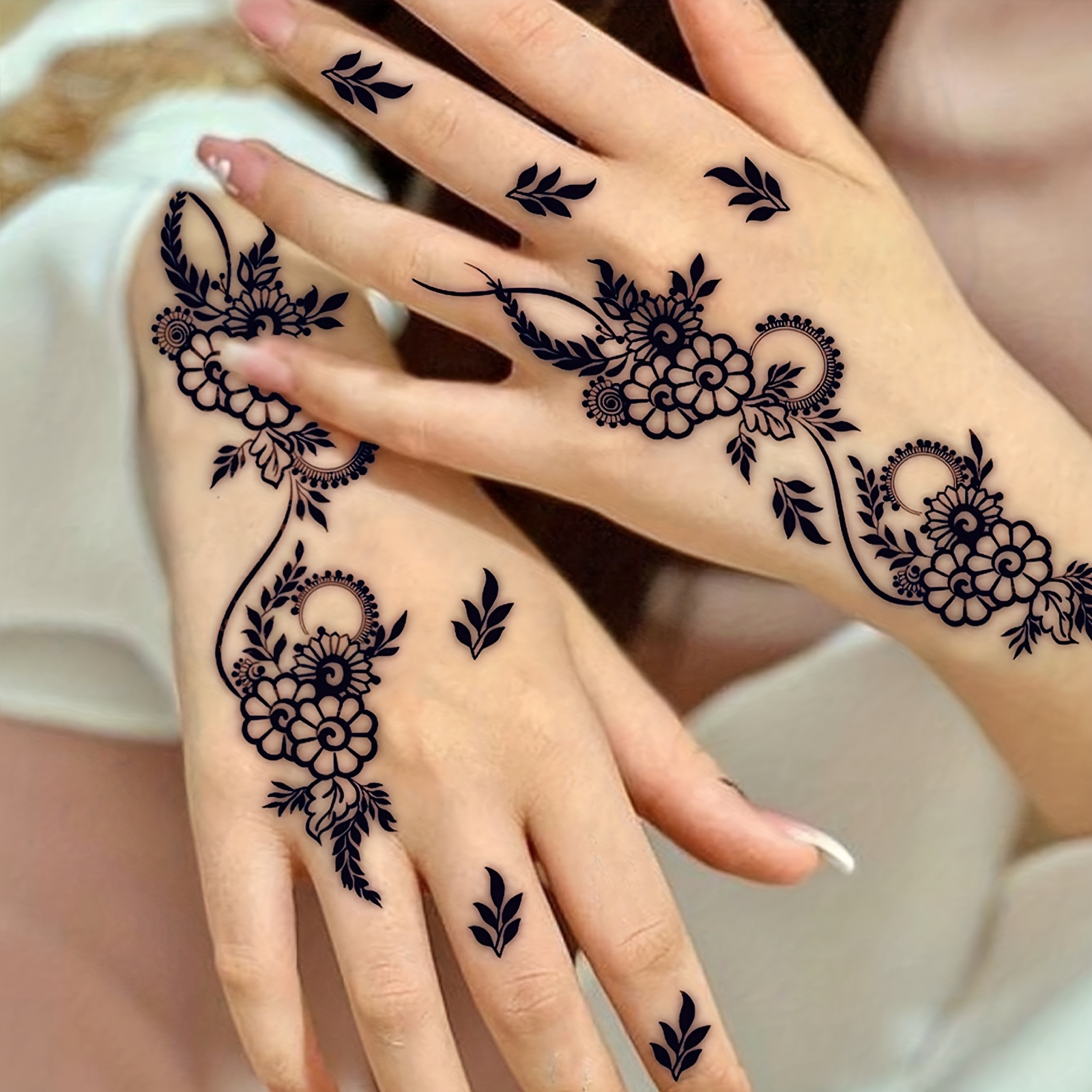 a temporary tattoo sticker featuring   that last 7 14 days including ink style   flowers geometric floral patterns and lace lotus designs suitable for parties weddings and birthdays