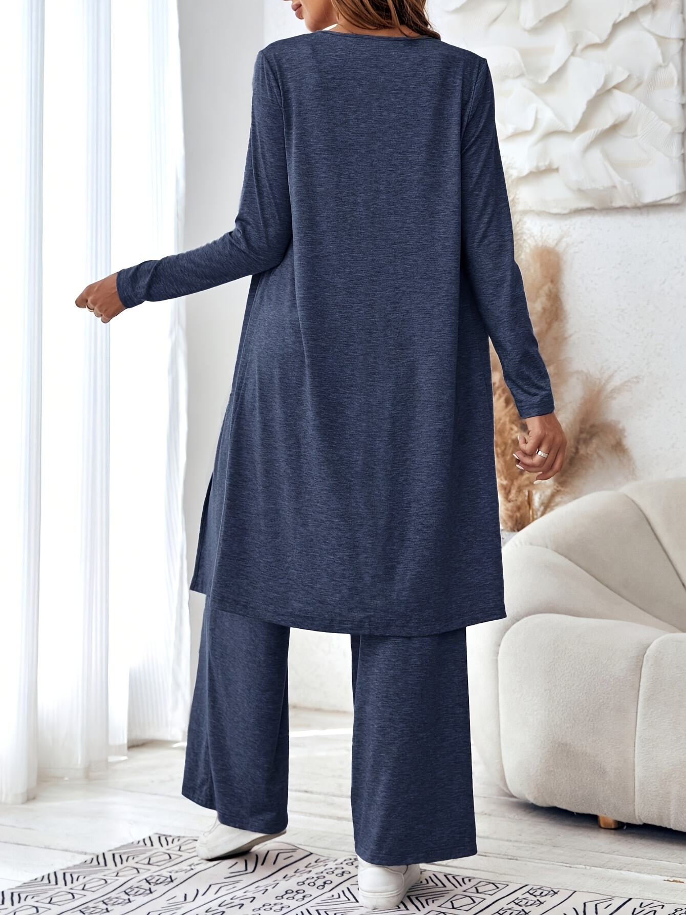 Side view of the elegant three-piece outfit