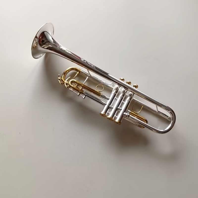   plated golden two tone trumpet in bb key suitable for beginners and adults professional performance
