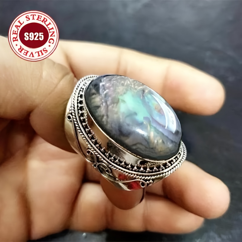 TEMU S925 925 Silver Ring Featuring Synthetic Turquoise And Carved Designs, From An Old Oval Light Opal. This Ethnic-style Retro Patterned Ring Is