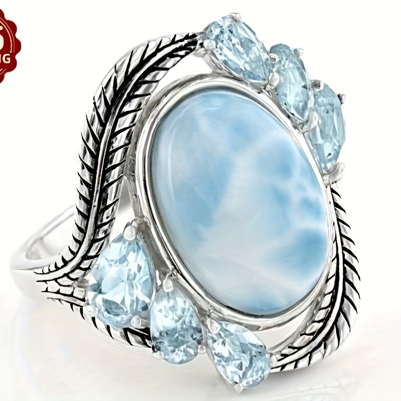 TEMU Bague Élégante pour Femme en Argent Sterling S925 - Design Luxueux avec Éléments de Plumes et Bleue Transparente pour une Ambiance - Idéale pour