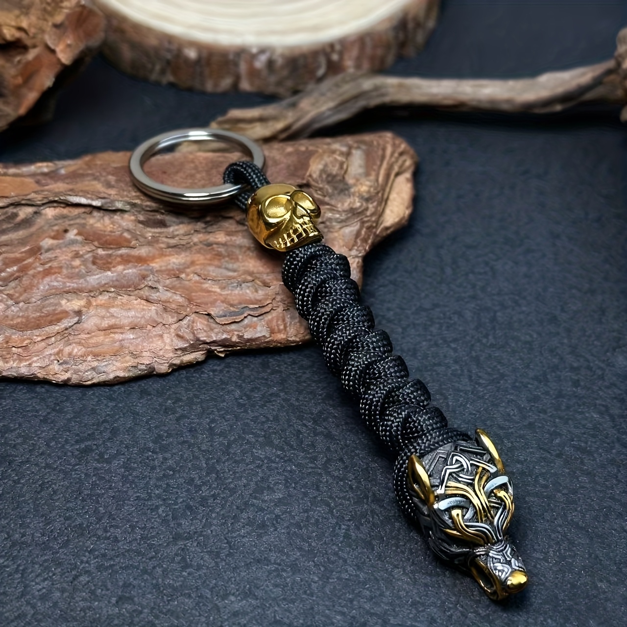 TEMU Llavero de acero inoxidable con cabeza de lobo vikingo para hombre con calavera trenzada de paracord de al