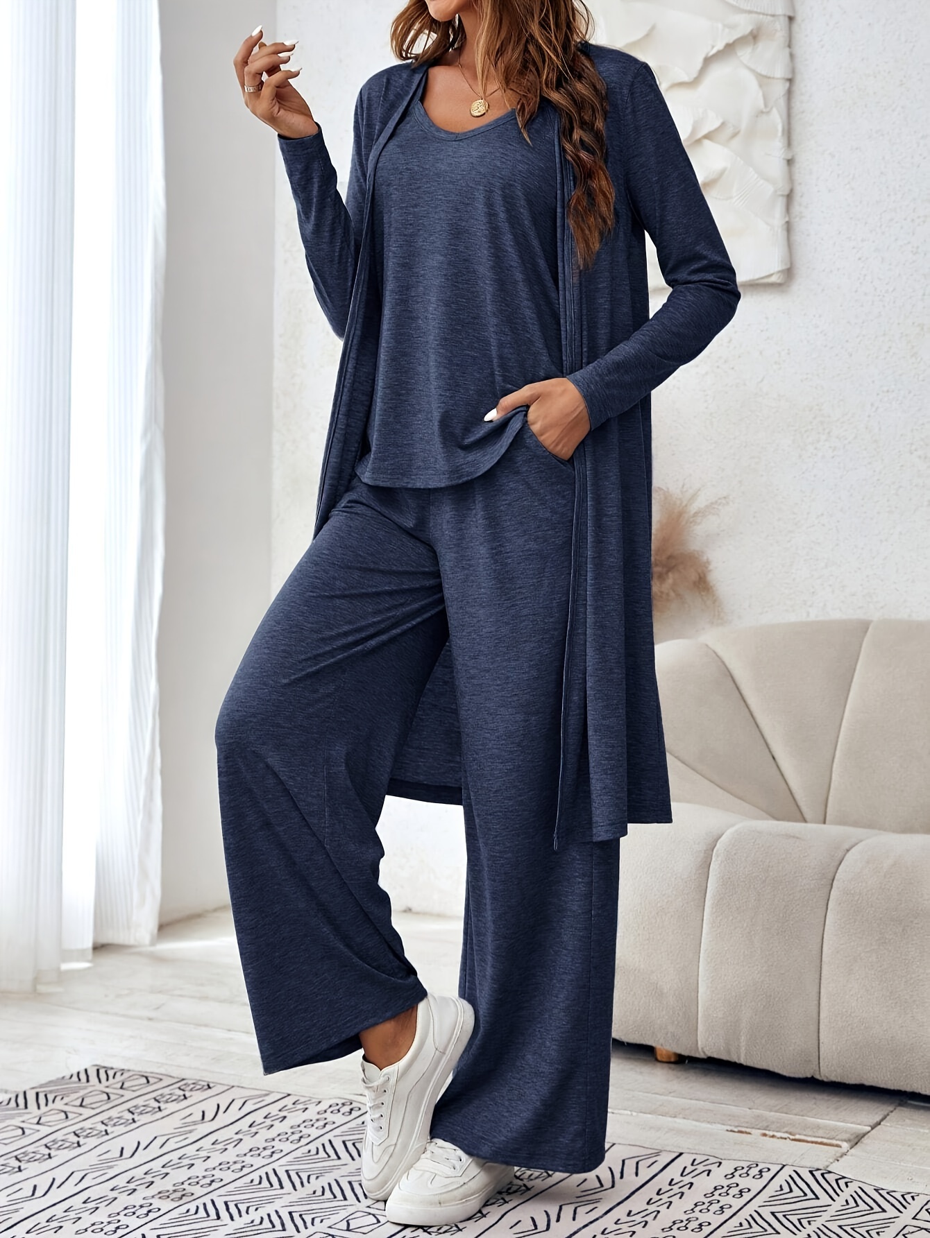 Close-up detail of the knit fabric and the layered look