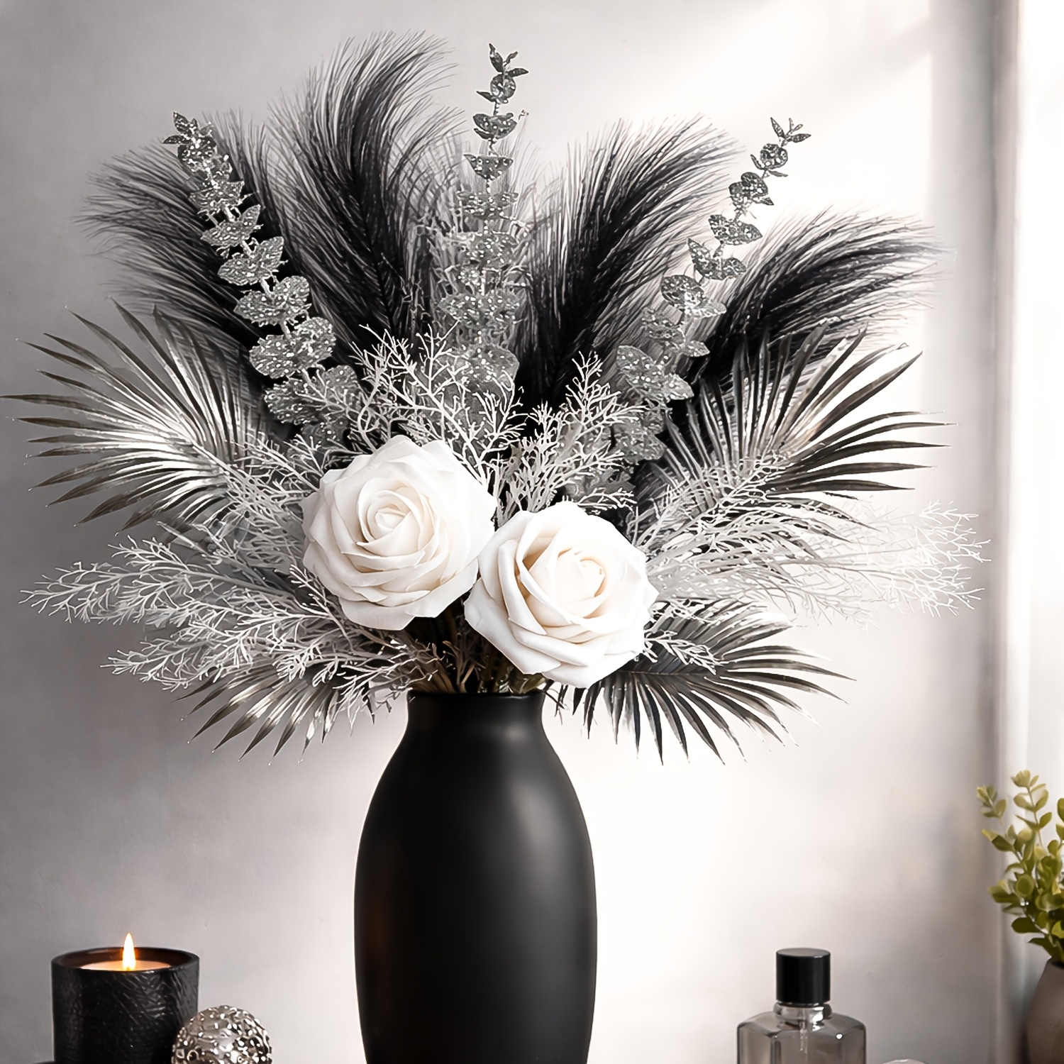 A Set Of Elegant Decorations In Black And White, Featuring Silvery-textured Leaves, Perfect For A Sophisticated Atmosphere On Living Room Or Entrance Tables