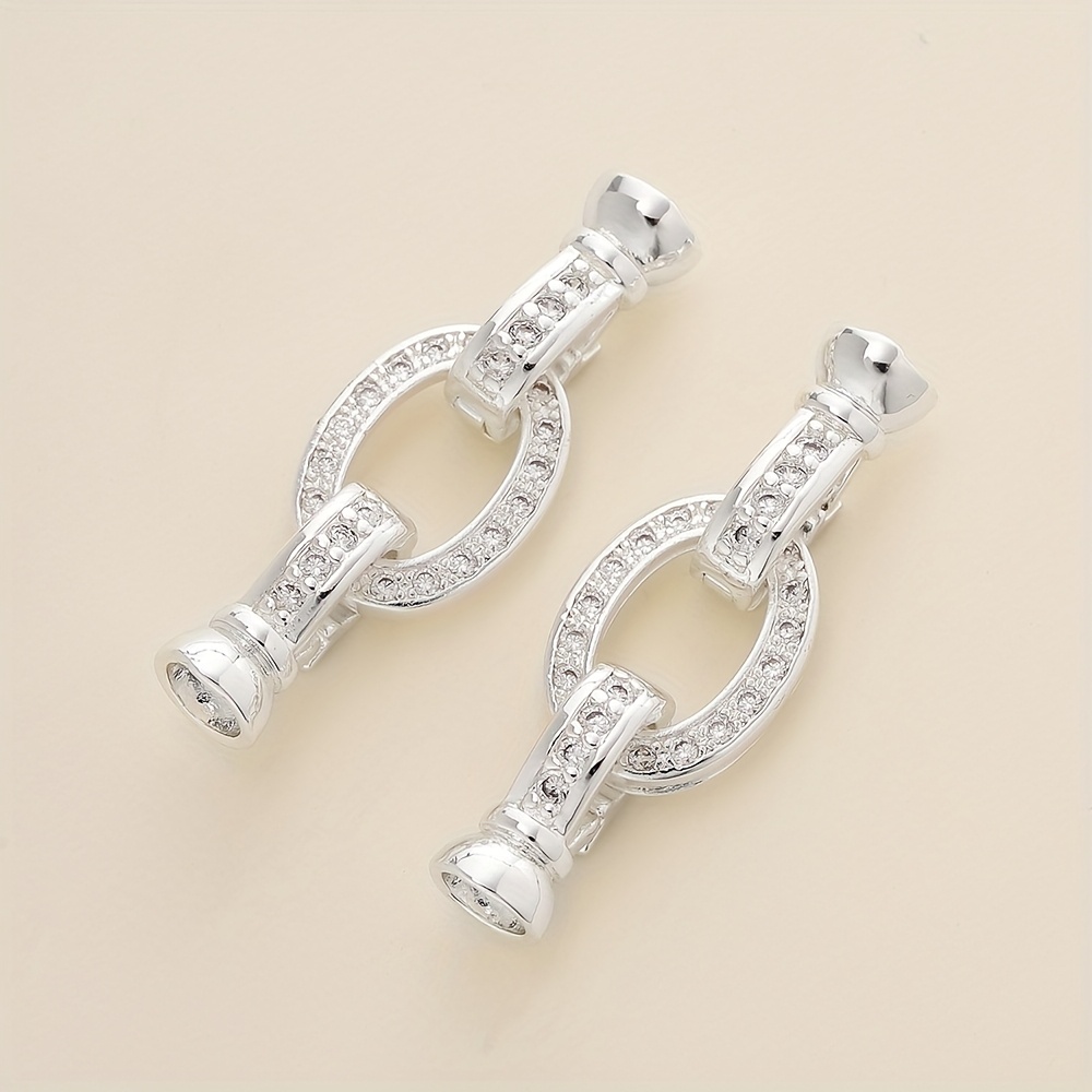 E-shop Set mit 2 vergoldeneten Messing-Verbindungsverschlüssen mit Zirkonia, ideal zum Schmuck selbst herstellen wie Armbänder und Halsketten