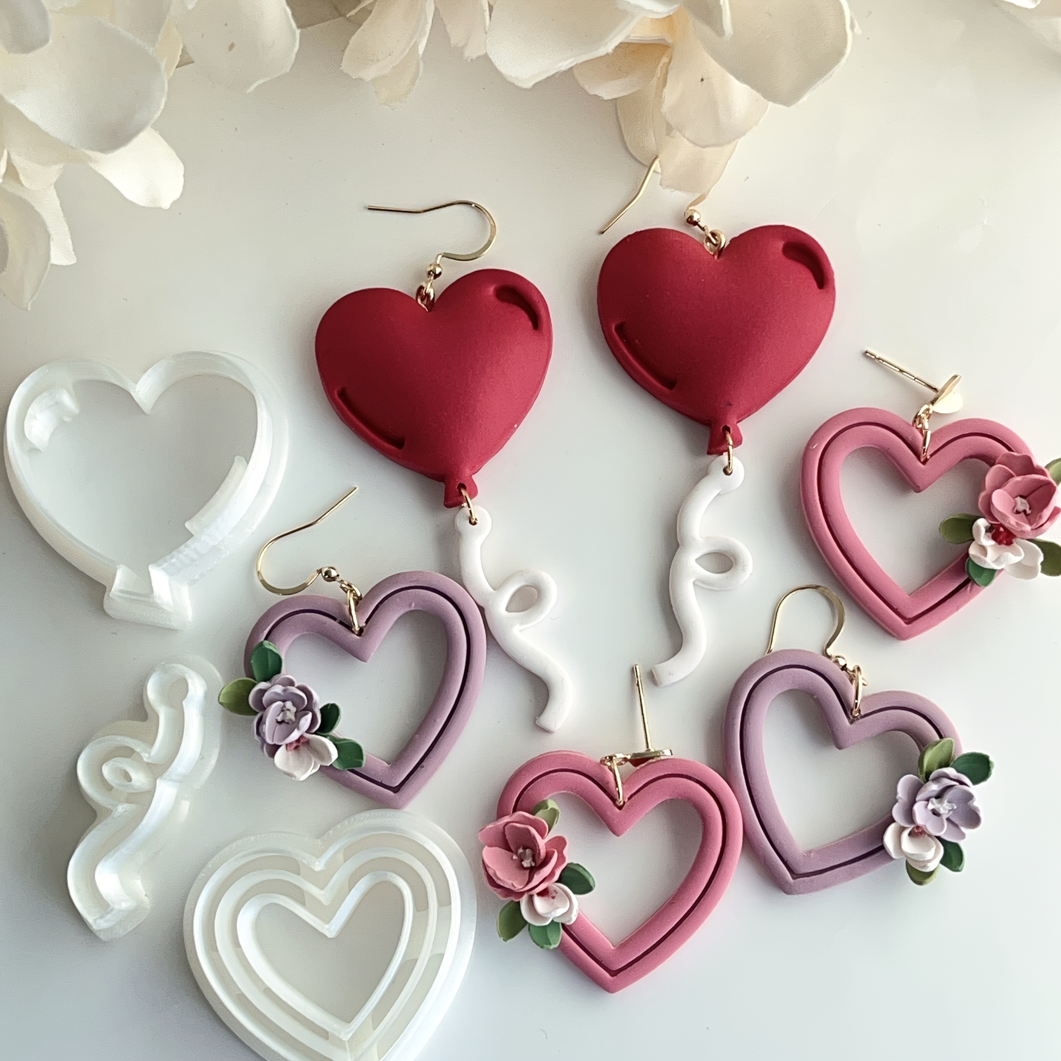 

A Set Of 3 Heart-shaped Balloon Polymer Clay Molds, Valentine's Day Heart-shaped Soft Clay Earrings, Made From Plastic Material, For Soft Clay Earrings And Jewelry Making Tools.