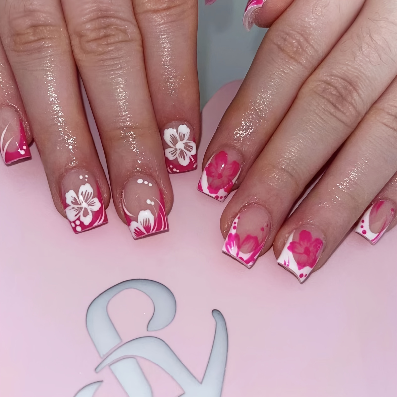 

24-piece Pink And White French Tip Nail Set With Floral Design - Square Shape, Short Length, Glossy Finish With Jelly Glue And Nail File Included.