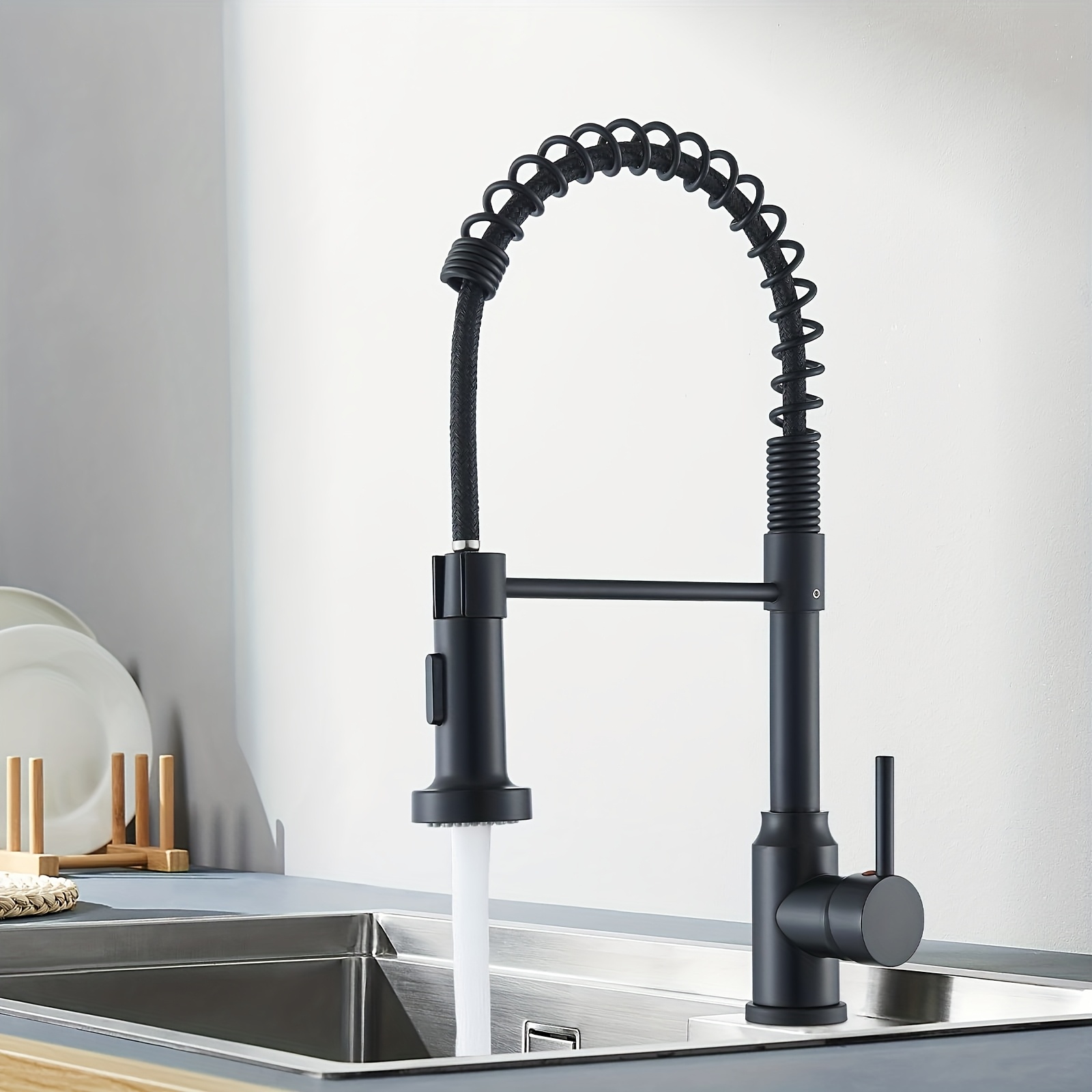 TEMU Contemporary Kitchen Faucet Featuring A Single Handle And A High , With A Pull-down Sprayer In Matte Black And Brushed Nickel End. It Allows For