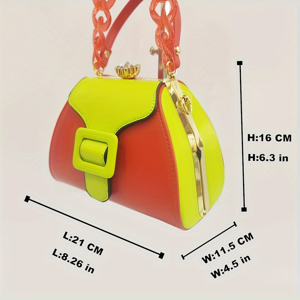 Stylish Two-Tone Round Handbag Made of Durable, Featuring a Detachable Acrylic Chain And Snap Closure. This Versatile Handbag Is Perfect for Both Parties And Everyday Use.