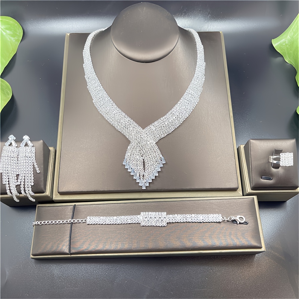 

Sparkling Jewelry Set Artificial Crystal Rhinestone Decor Full Rhinestone Necklace Bracelet Ring And Earrings Set Party Banquet Bridal Wedding Jewelry Set Gifts For Eid