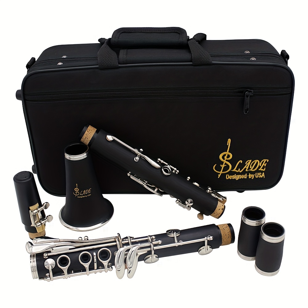   red clarinet lower b rubber wood body 17 key 6 loop black   red cloth box and standard