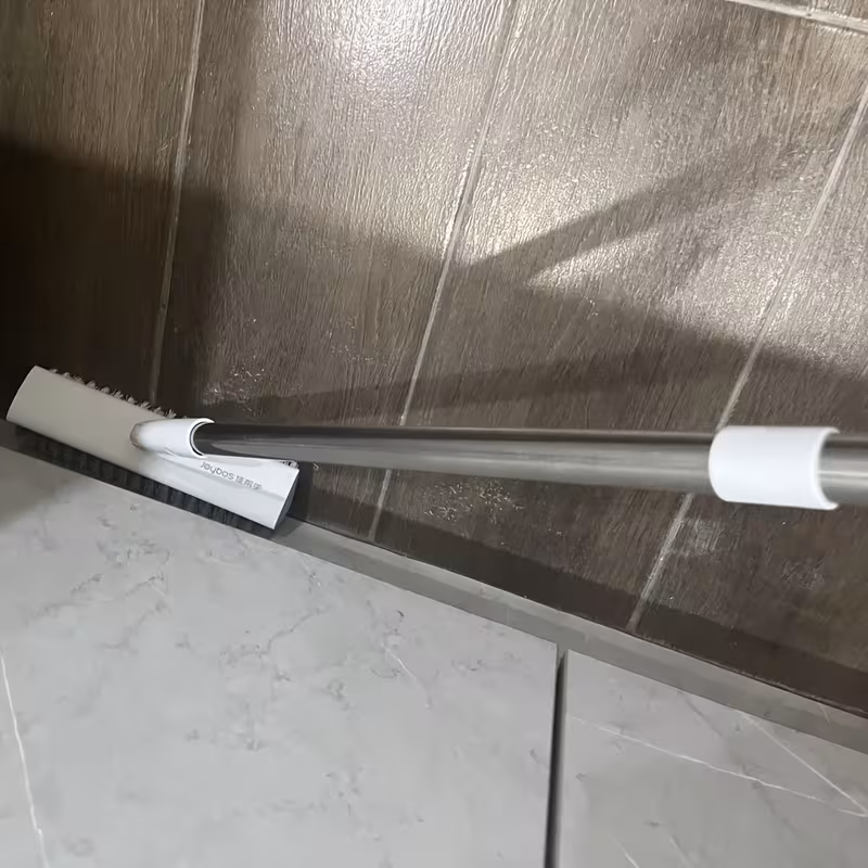 one piece of a dual sided floor cleaning brush with a 52 36 inch extendable handle featuring degree rotating v shaped design ideal for scrubbing showers without scratching floors tiles tubs and bathrooms Product details 8