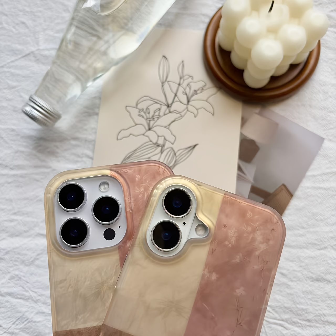 A Phone Case Featuring a Four-Color Stitching Pattern That Incorporates Bamboo, Orchids, Calligraphy, And Plum Blossoms, Compatible with iPhone Models 13, 14, 15, And 16 Pro Max.