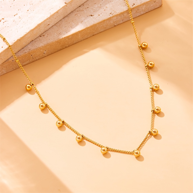 Image of Classic Fashionable And Elegant Golden Stainless Steel Bead Necklace With Simple Luxurious Niche And Innovative Design Suitable For Women To Wear Or As A Gift For Daily Banquets Parties And Gatherings