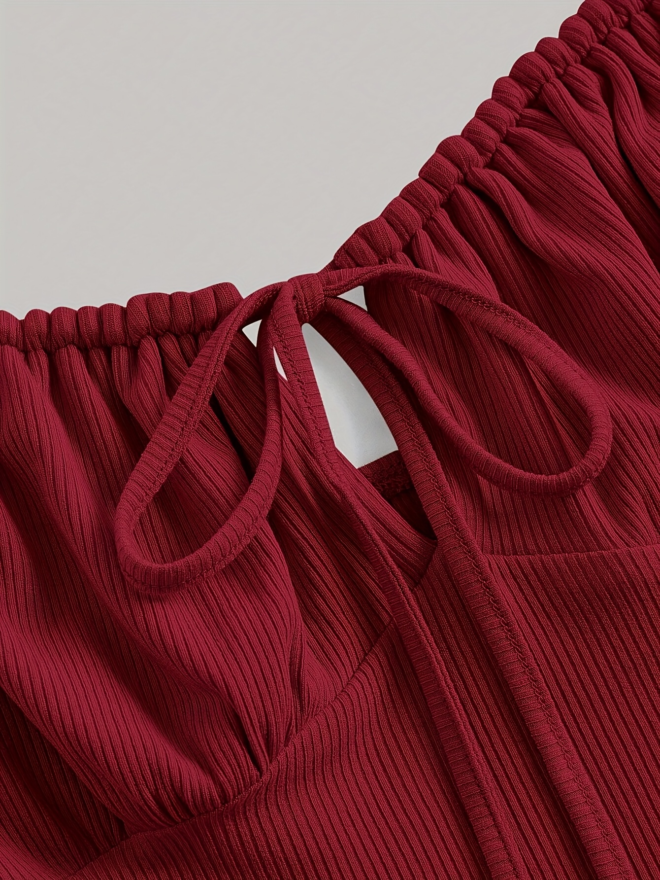 A Stylish Dress for Women Featuring Front Pleats, a Tied Chest, And Shoulder Straps