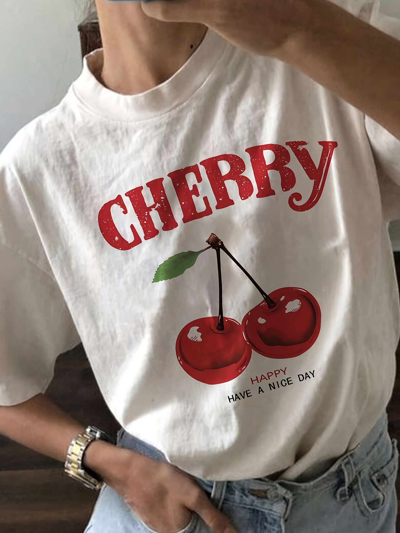 cherry tee shirt sold on Temu United States